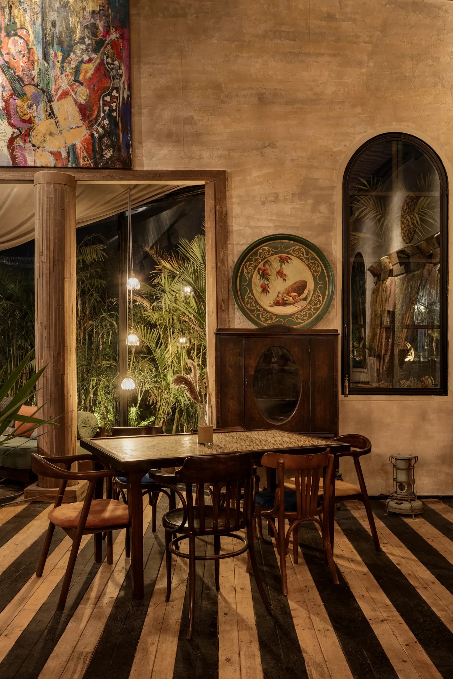 Arched wall niche and an intimate table setting at Babbo's