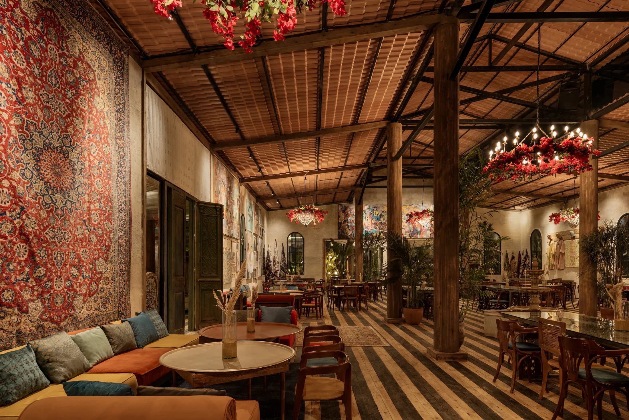 Babbo's lounge seating, patterned wall and open dining room